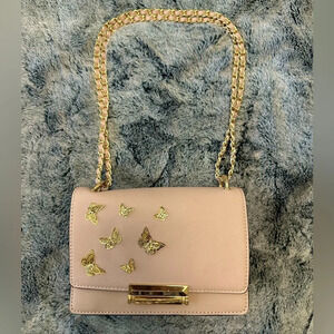 ALDO pink and gold butterfly bag